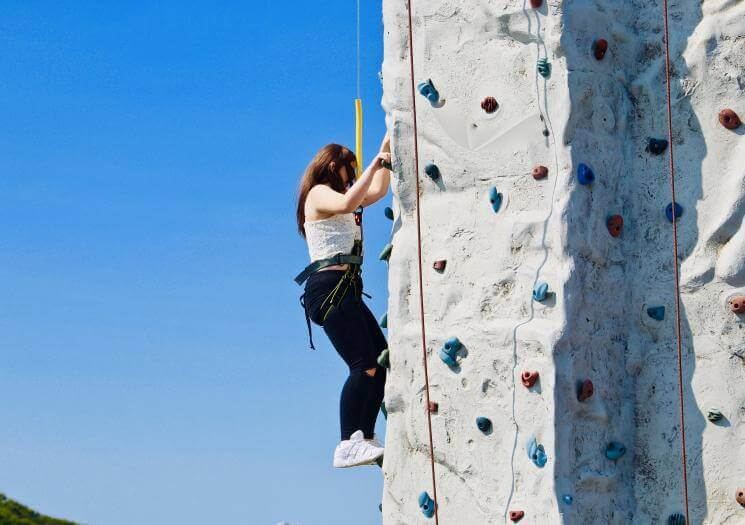 Climbing the 7.4 metre wall